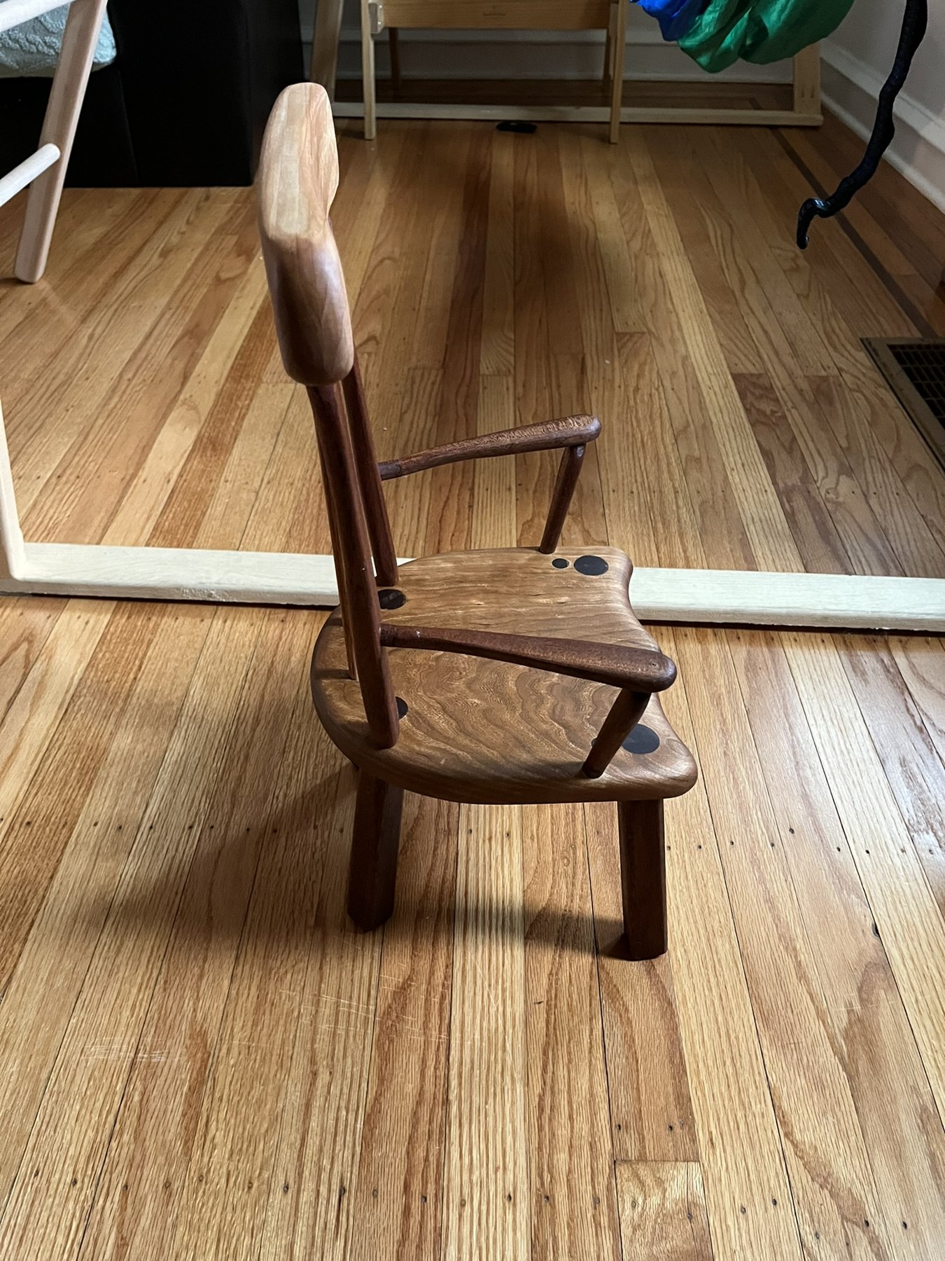 Side view of the wooden stick chair