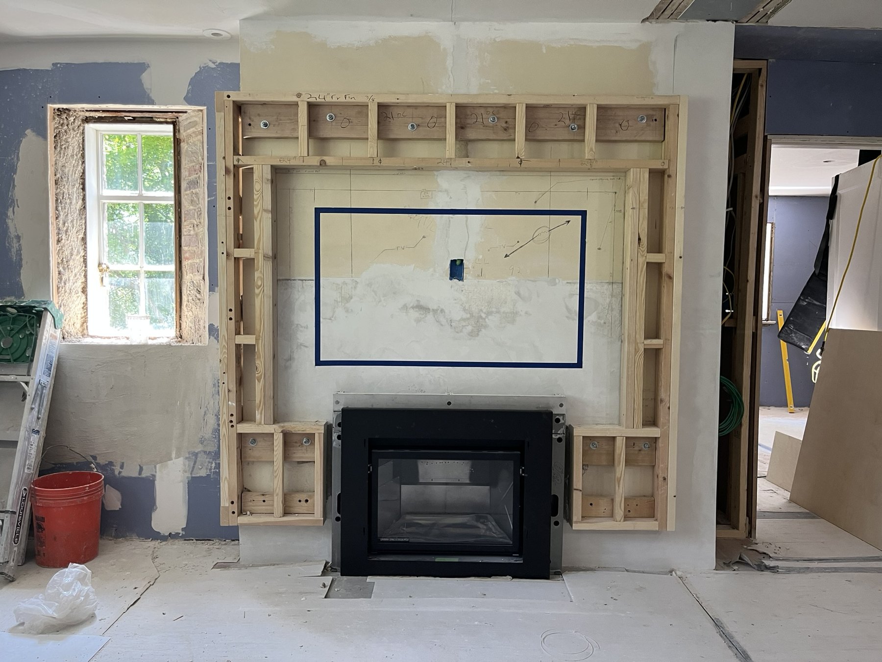 Framed fireplace surround with the insert in place