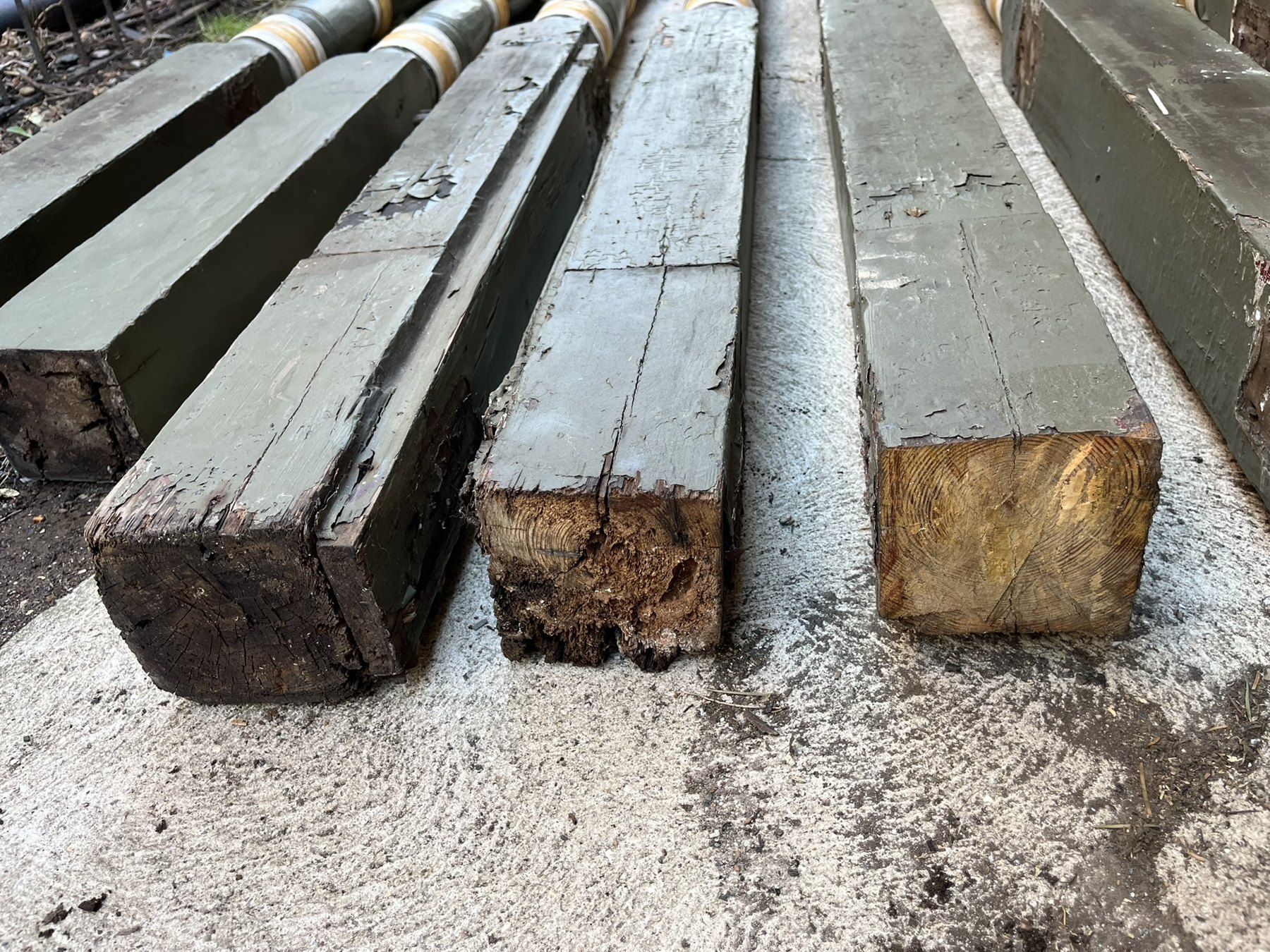 Decayed ends of retained turned porch posts