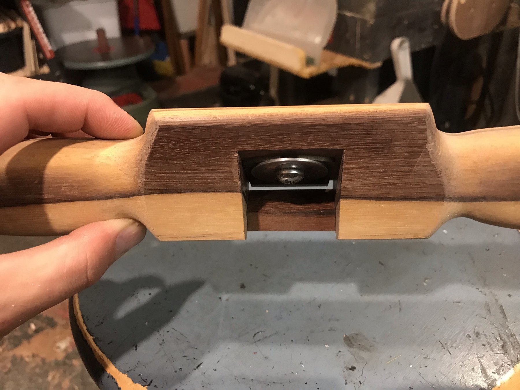 Handmade wooden spokeshave with contrasting handles and body