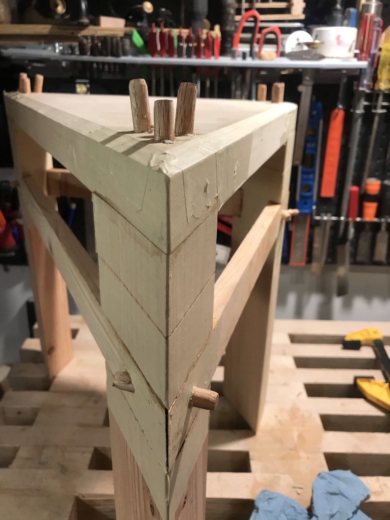Angled wooden table frame with fitted corner joints